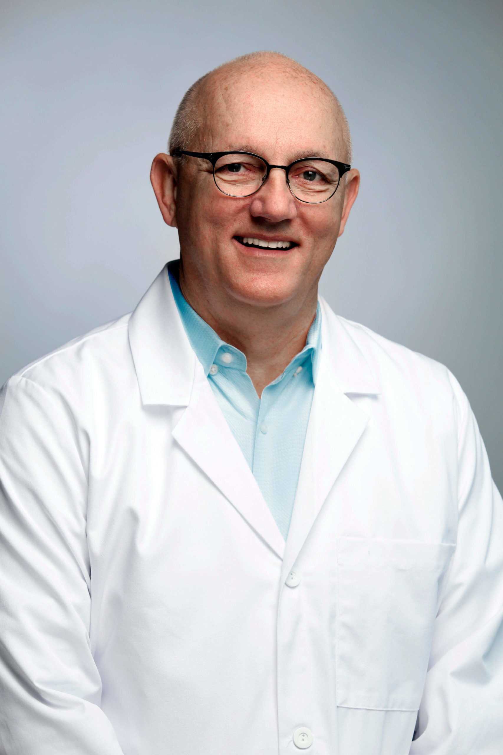 Dr. Mark L. Dake